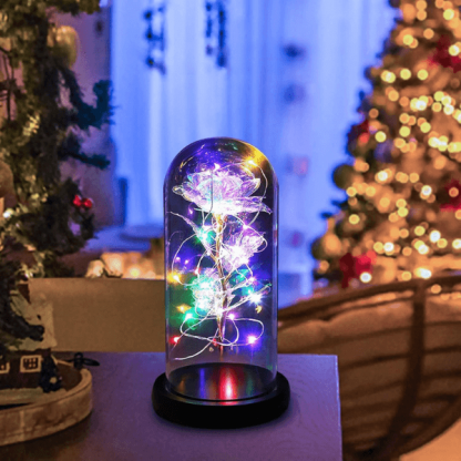 Trandafir luminos de cristal în cupolă de sticlă